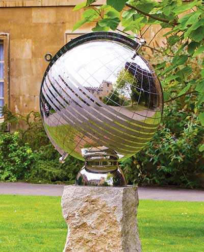 Globe sundial in stainless steel that doubles as a moon dial