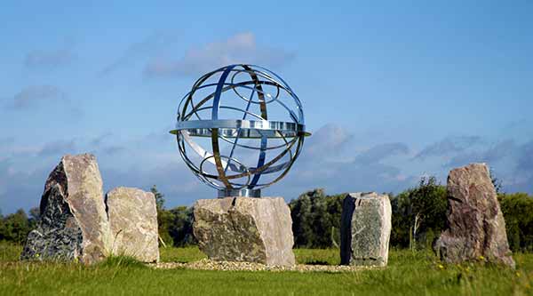 Armillary sphere sundial surrounded by monoliths at Eton Colleg rowing centre