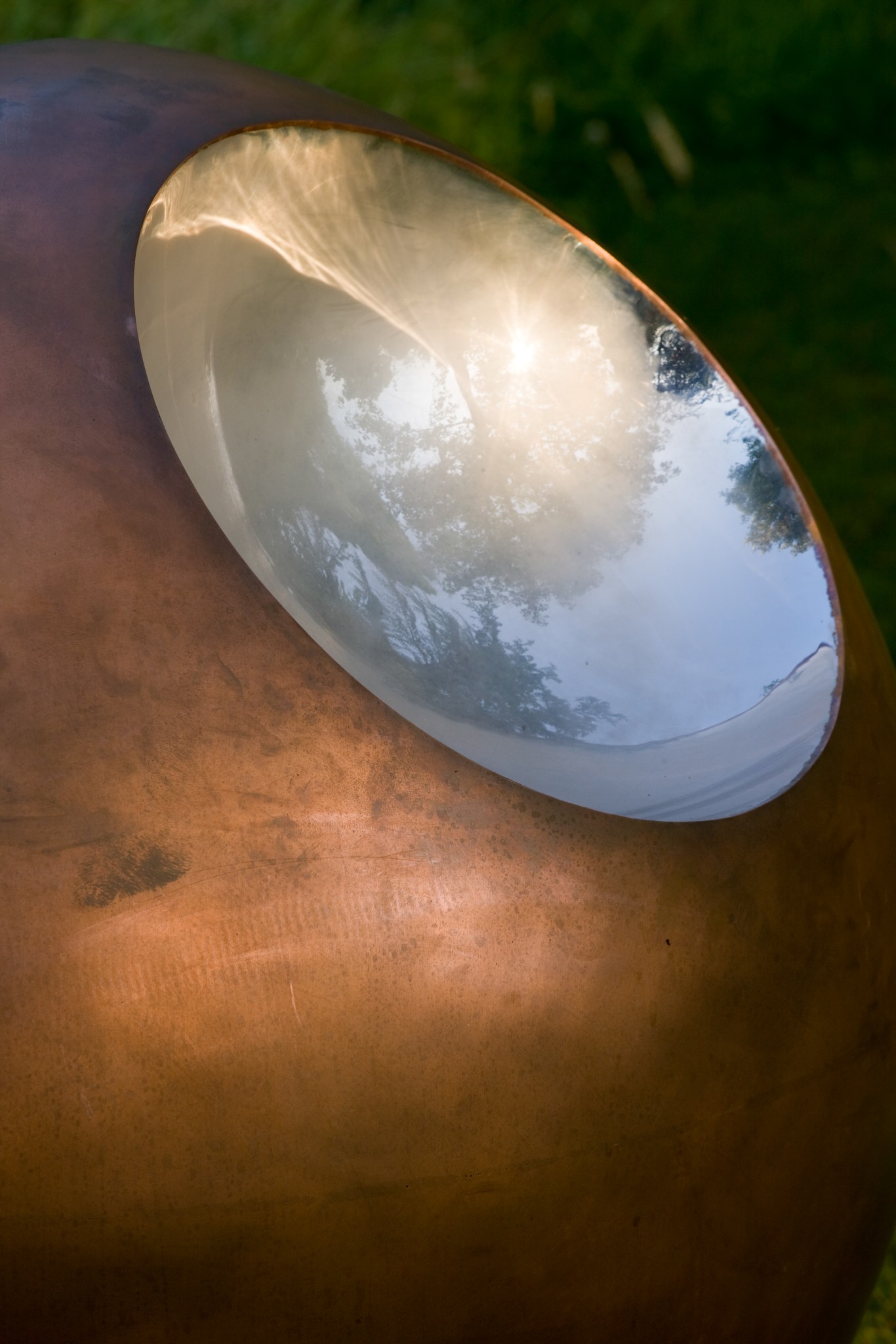 Bite bronze garden sphere