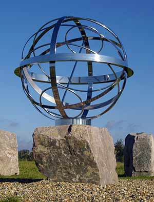 Armillary sphere in a stone circle for historic school