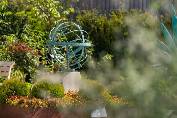 bronze verdigris armillary sphere at the lavershot barns